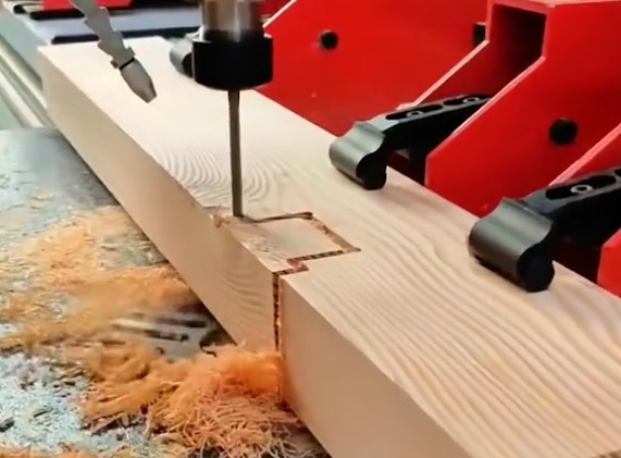 CNC wood machining cutting a wooden panel with high precision