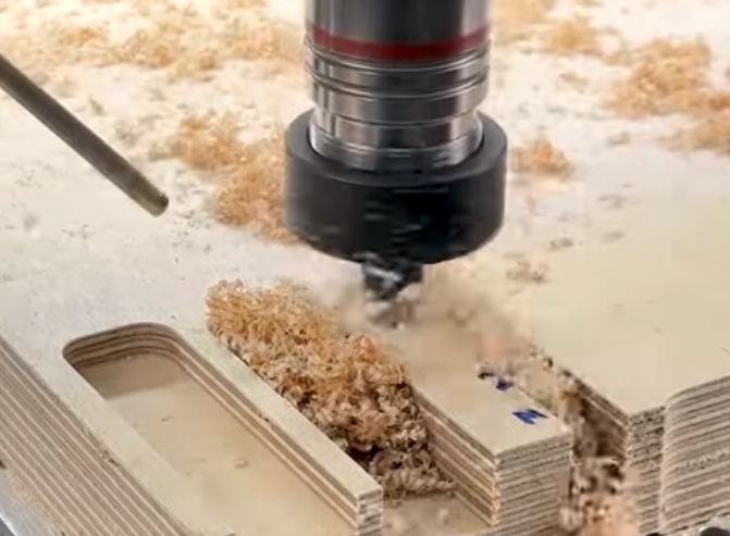 Wood milling process using a CNC router to shape wood panels