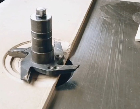 Close-up of wood milling cutter showing cutting edges and geometry
