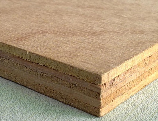 plywood sheet showing layered wood veneers and cross-grain construction