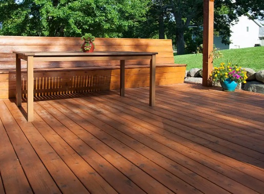 Applying wood preservative to outdoor timber decking