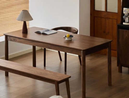 Solid wood dining table showcasing natural grain patterns